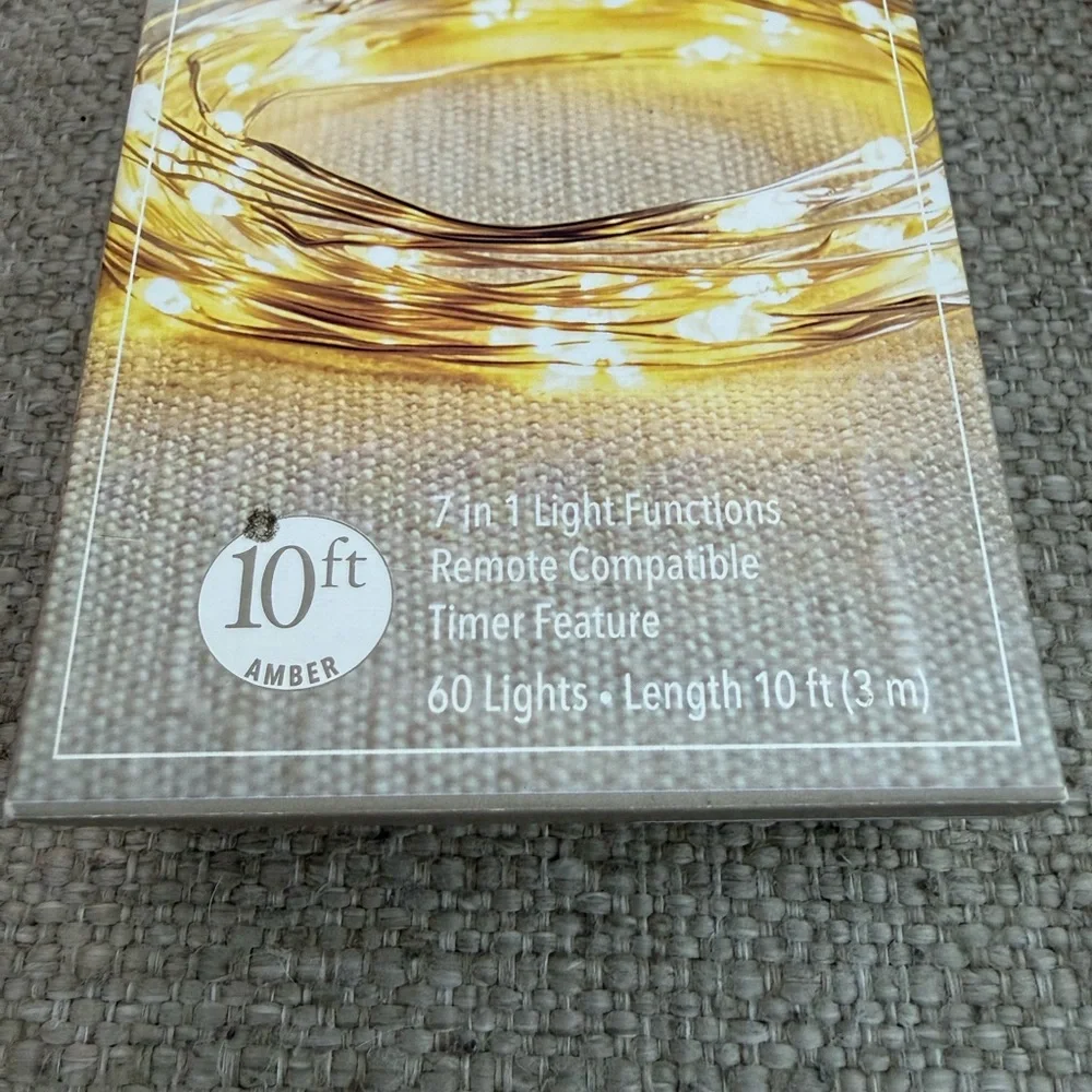 NIB Pier 1 Exclusive Glimmer Lights 10 ft Timer Auto Shut Off.